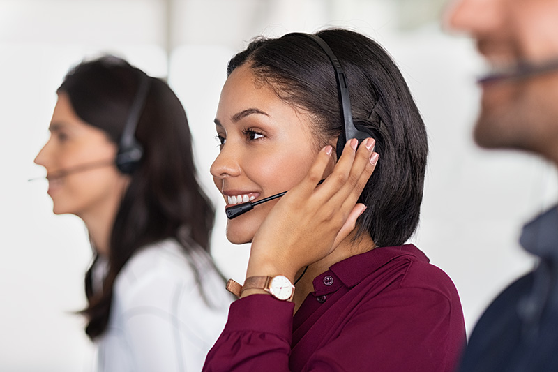 Lady with headset providing call handling services