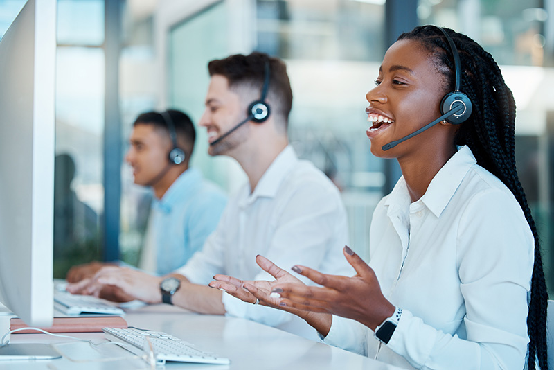 People working in a call centre on the phone