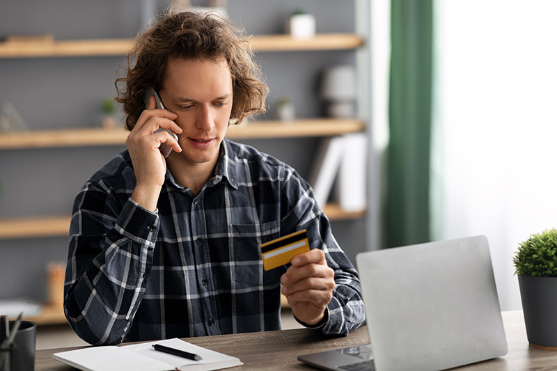 man calling a business number