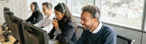 A row of virtual receptionists answering calls